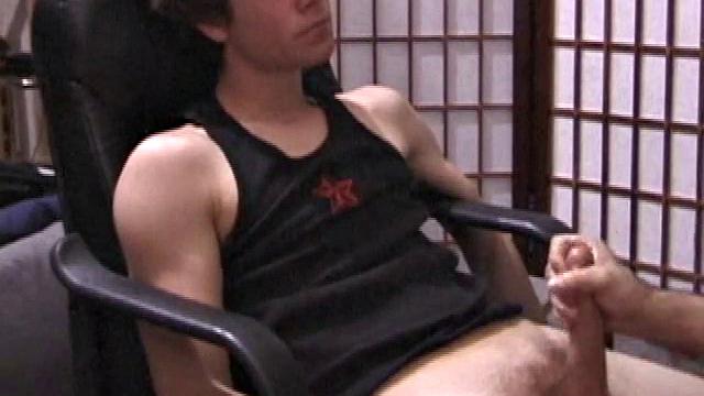 A shaved head and a naughty but nice looks belong to Kenny. Already shirtless, he pulls his pants and boxers down around his ankles and gets to work on his thick cock.