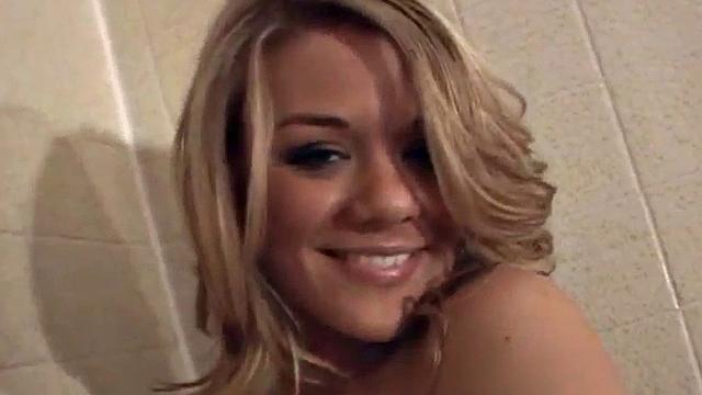 Naked teen babe gets wet