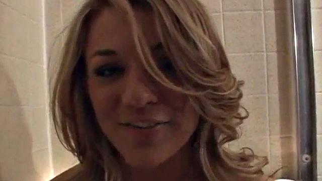 Naked teen babe gets wet