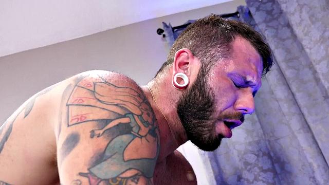 MILF with tattoos & hair pulls takes on two guys at once in wild threesome