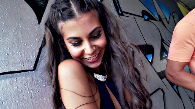 Watch this petite teen deepthroat a huge white cock in public!