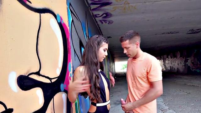 Watch this petite teen deepthroat a huge white cock in public!