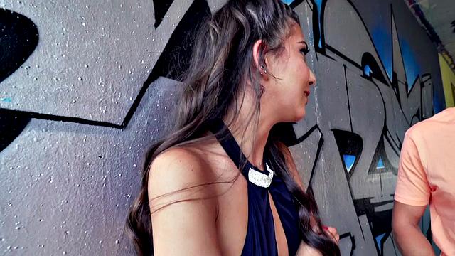 Watch this petite teen deepthroat a huge white cock in public!