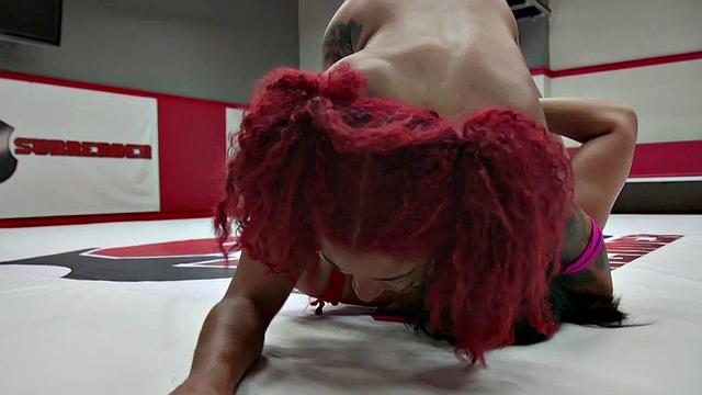 Redhead wrestler fights against Asian busty MILF
