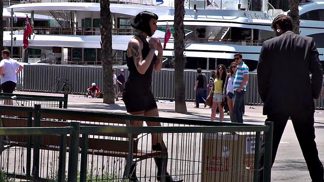 Petite naked teen humiliated in public by domina and master
