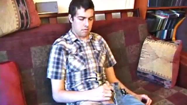 This shy guy has a major surprise in his pants. Luis takes his time stripping naked to reveal a nice looking cock, with a slight curve to it.