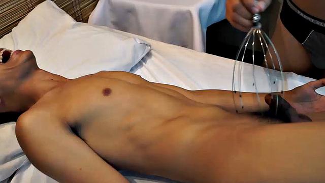 Asian gay tickling fetish boy visits the Erotic Asian Tickling Parlor for a sensual tickling experience. Our tickling masseur uses feathers and wire scalp massaging tool.