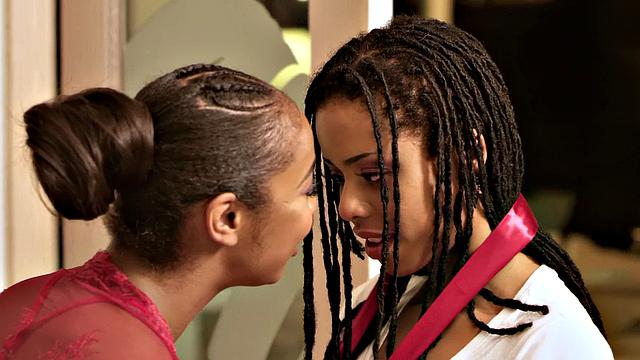 Hot black and small-titted lesbians get kinky in the bedroom