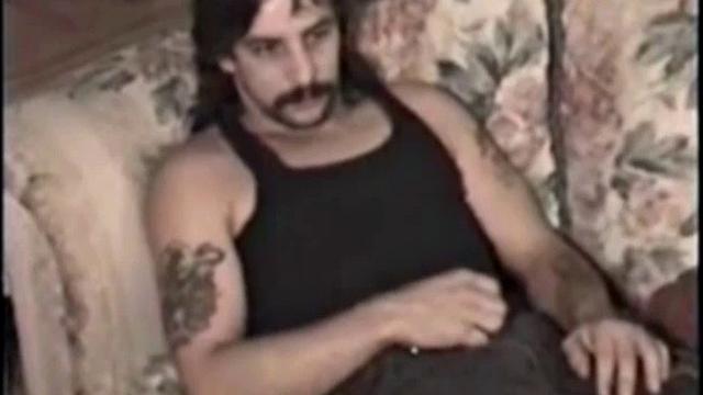 Rugged and good looking Tim gets a visit from hairy and well hung Larry. It doesn't take long and these two are naked, getting it on.