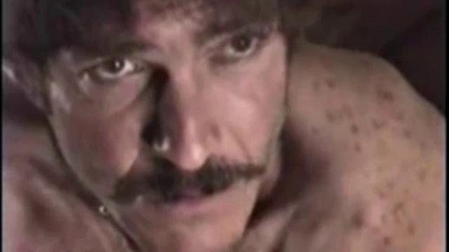 Rugged and good looking Tim gets a visit from hairy and well hung Larry. It doesn't take long and these two are naked, getting it on.