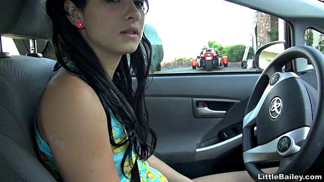 Little Bailey choking on a dildo while she masturbates