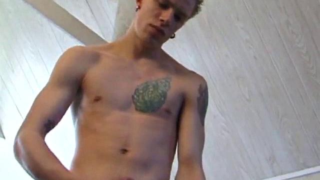 After returning from skateboarding, Shane strips down and starts tugging on his cock. Following some serious stroking, Shane cums all over his skateboard.