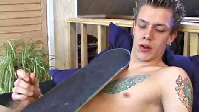 After returning from skateboarding, Shane strips down and starts tugging on his cock. Following some serious stroking, Shane cums all over his skateboard.
