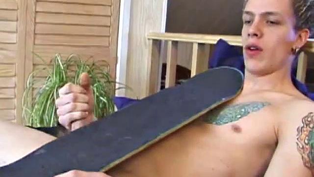 After returning from skateboarding, Shane strips down and starts tugging on his cock. Following some serious stroking, Shane cums all over his skateboard.