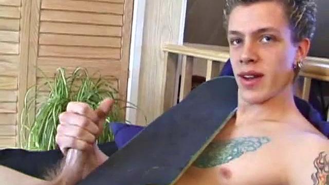 After returning from skateboarding, Shane strips down and starts tugging on his cock. Following some serious stroking, Shane cums all over his skateboard.