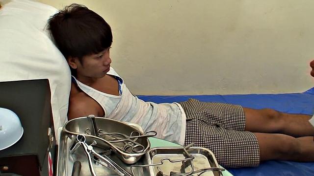 Twink Asian jerking while getting fucked by doctor
