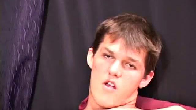 Sucking on a huge dick through a glory hole, 20 year old Nick shows his oral skills. The guy receiving the blow job loves it and in no time the stud strokes his cum load onto Nick's face.