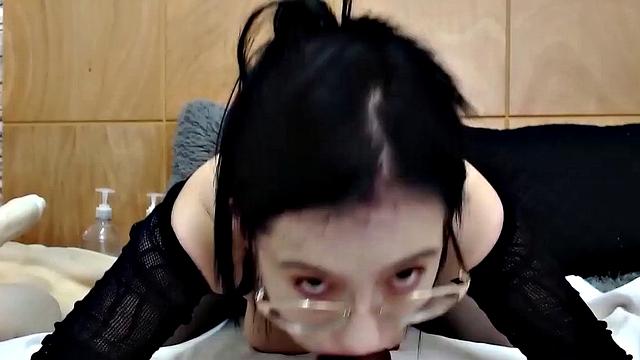 Mature takes huge dildo in her mouth and ass