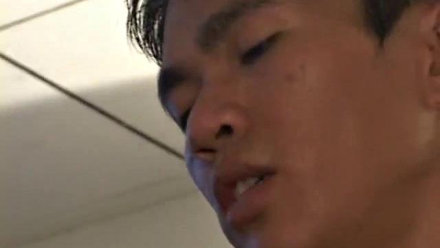 Peeking into the office, we find assistant coach with mouth wrapped around intern's cock. Poj then decides to take Kie's cock into his own hands.