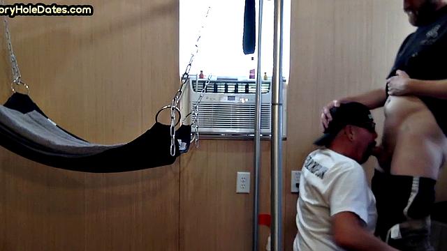 Gloryhole amateur DILF fucked by stud in sling after blowjob