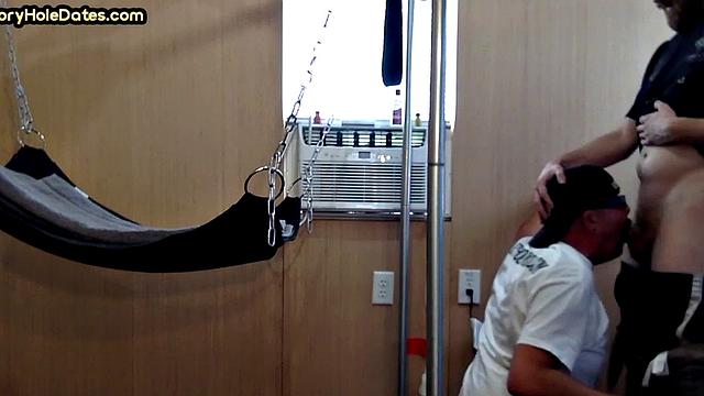 Gloryhole amateur DILF fucked by stud in sling after blowjob