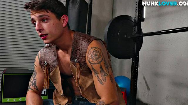 Cowboy with tattoos fucks cosplay bottom in gym