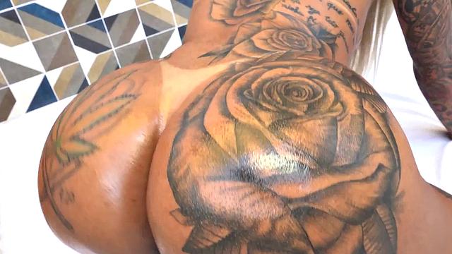 Inked big ass trans from Brazil teases