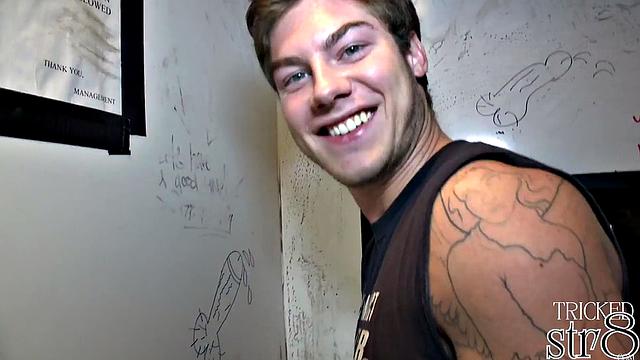 Muscular sporty guy gets surprised at the gloryhole by another man