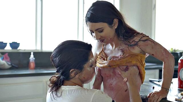 Food fetish dykes rub chocolate pussies on kitchen table