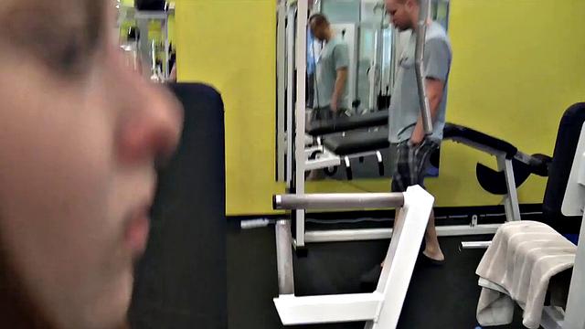 Athletic babe with a big butt gets naughty with a hunter in the gym