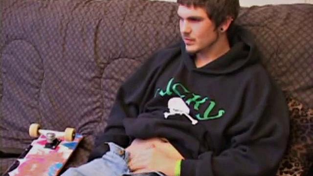 skater guy takes a break from tricks, but his hand's still working overtime