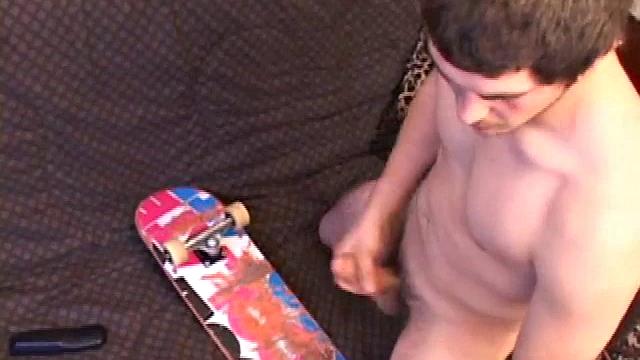 skater guy takes a break from tricks, but his hand's still working overtime