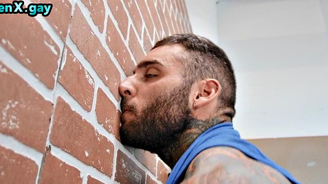 Manly jock with muscled inked body fucks policeman in the toilet