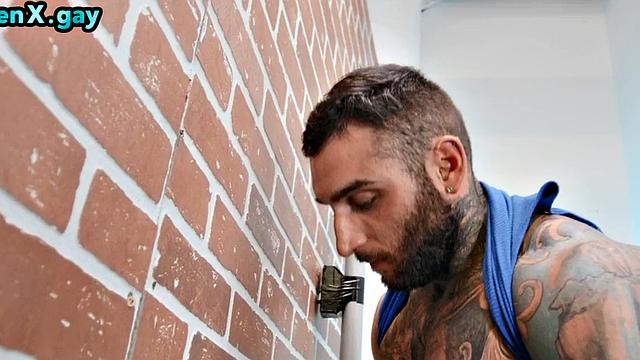 Manly jock with muscled inked body fucks policeman in the toilet