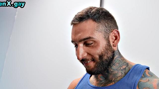 Manly jock with muscled inked body fucks policeman in the toilet