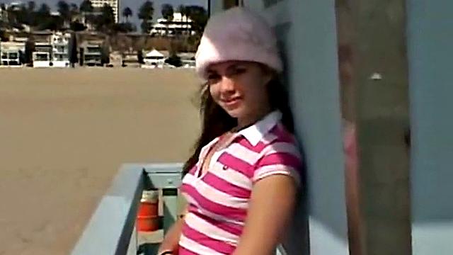 Little April fingering her tight brown hair-free pussy in the car