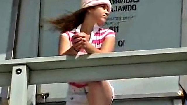 Little April fingering her tight brown hair-free pussy in the car