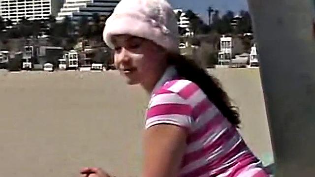 Little April fingering her tight brown hair-free pussy in the car