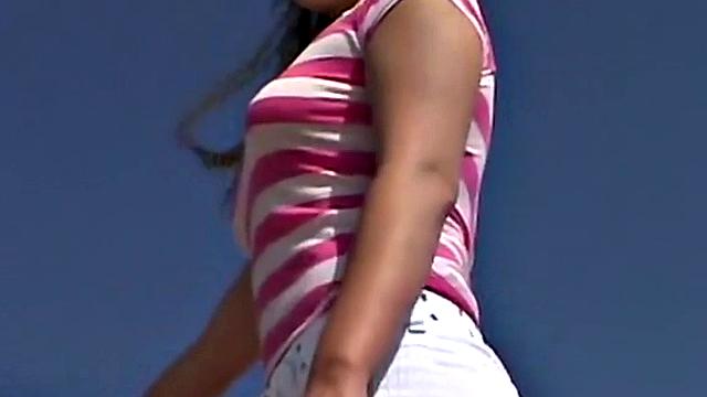 Little April fingering her tight brown hair-free pussy in the car