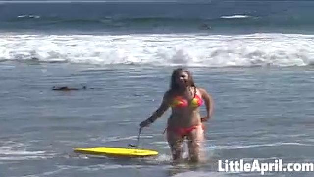Teen Little April Teases By Playing in the Ocean