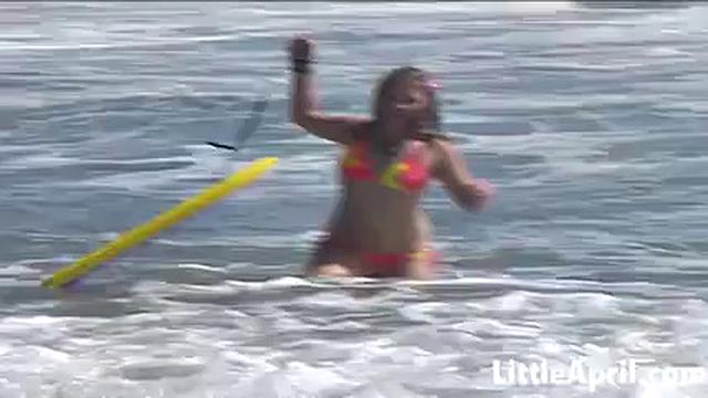 Teen Little April Teases By Playing in the Ocean