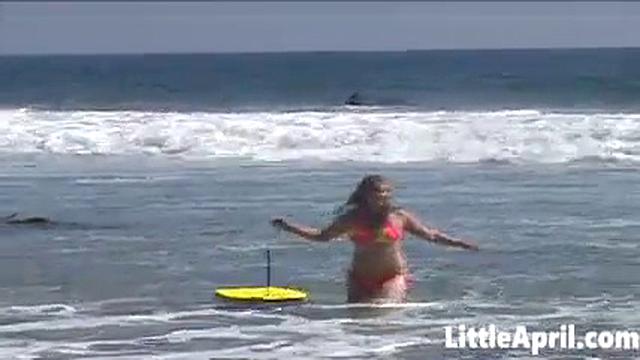 Teen Little April Teases By Playing in the Ocean