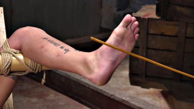 Bastinado session for submissive