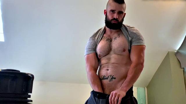 Bearded hunk fingering butthole for cumshot