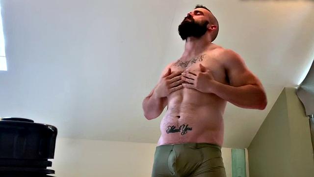 Bearded hunk fingering butthole for cumshot