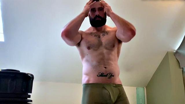 Bearded hunk fingering butthole for cumshot