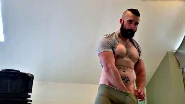 Bearded hunk fingering butthole for cumshot