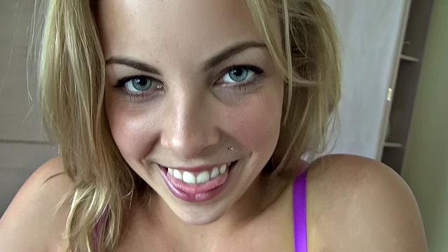 Blonde bombshell rubs her pussy and gives a tight handjob in thong