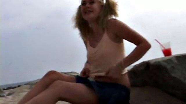 Little Summer fingering her pussy at the beach