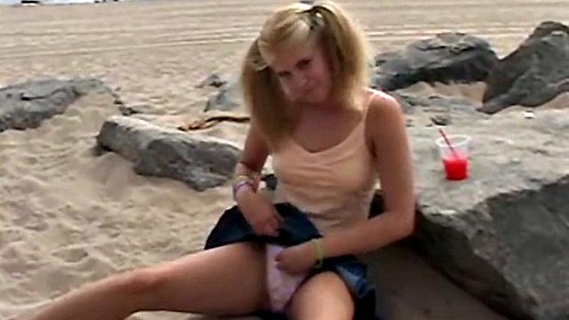 Little Summer fingering her pussy at the beach